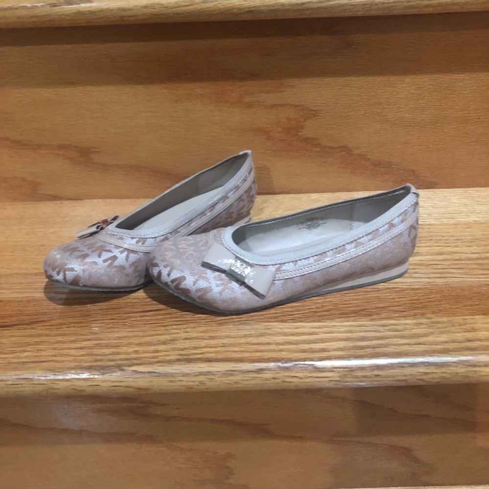 Michael Kor’s  tan flats.